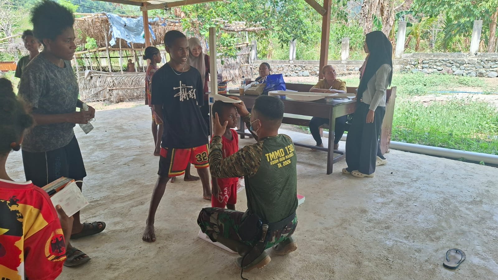 Satgas TMMD dan Dinkes Bersinergi Pantau Tumbuh Kembang Anak di Yamboi